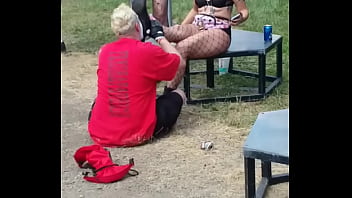 young skinny tanned girl seduced with older man outdoor picnic