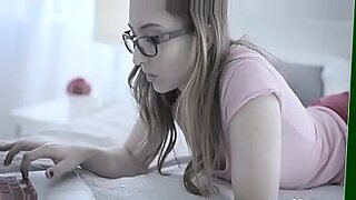 girl with green shirt and glasses