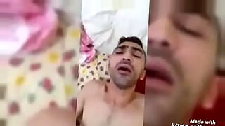 husband touch her wife breast on sleep