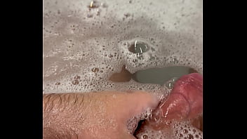 nude girl teasing in the tub